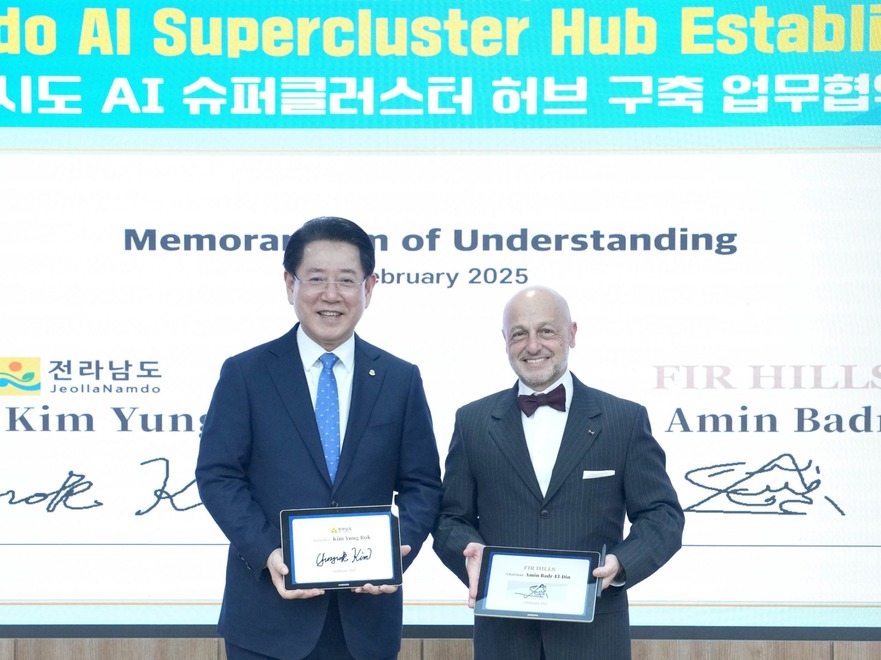 Kim Yung Rock, Governor of Jeollanam-do, and Amin Badr El Din, Chairman of Fir Hills, holding signed agreements at the Memorandum of Understanding (MoU) signing ceremony for the establishment of South Korea's AI Supercluster Hub in February 2025.